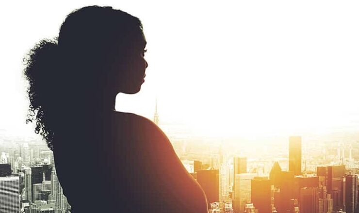 woman gazing over city