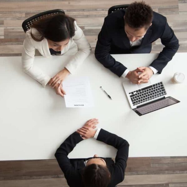 two business people conducting an interview