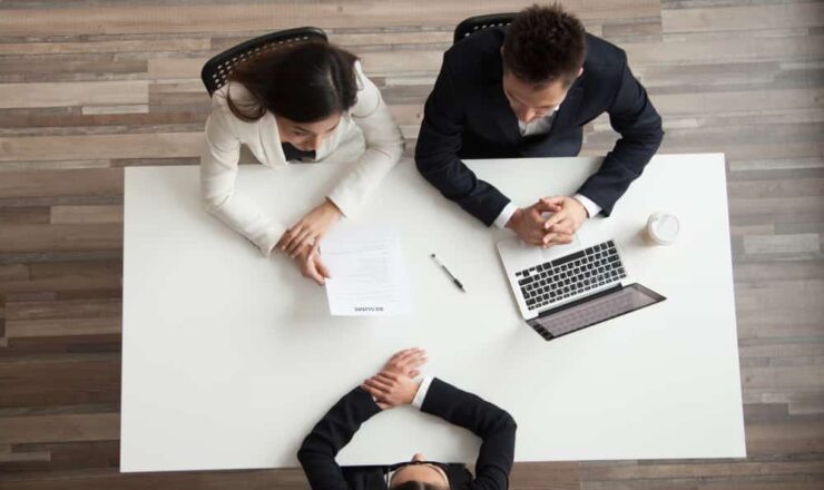 two business people conducting an interview