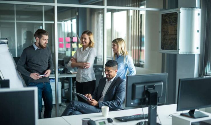 business colleagues talking in office